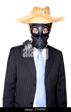 Picture of a man in a suit and gasmask and wearing sunglasses.. Stock Photo