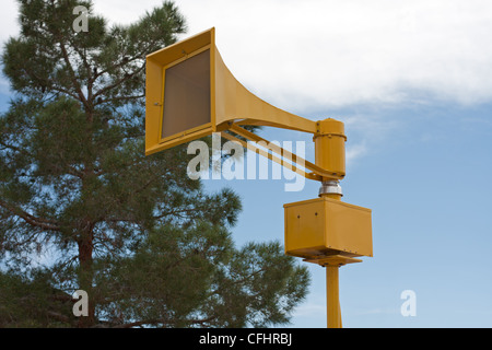 Tornado air raid tsunami siren on pole Stock Photo