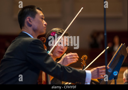 Paris, France, North Korean Symphony Orchestra 'the Unhasu Orchestra' together with 'Radio France Philharmonic Orchestra' Perform First Concert in Europe, in Salle Playel Theater, Asian Classical Musicians violin man stage Stock Photo