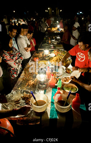 Stalls with cooked food at Forodhani Gardens Stone Town Zanzibar Tanzania Stock Photo