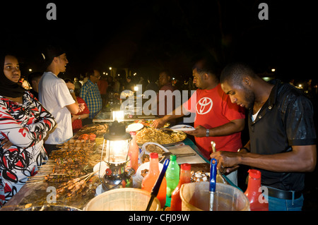 Stalls with cooked food at Forodhani Gardens Stone Town Zanzibar Tanzania Stock Photo