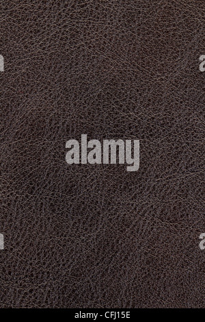 Dark brown natural leather background or texture close up Stock Photo