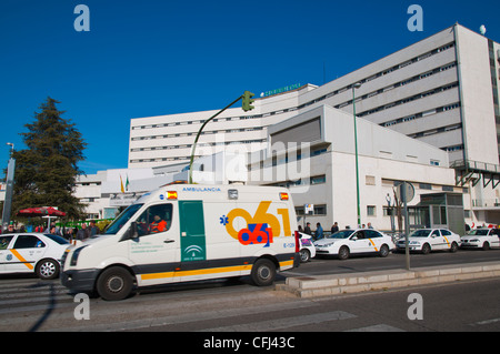 Ambulance in front of Hospital Universitario Virgen Macarena university hospital central Seville Andalusia Spain Stock Photo