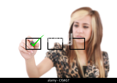 Young woman business hand with pen mark the check boxes. Hands on focus Stock Photo
