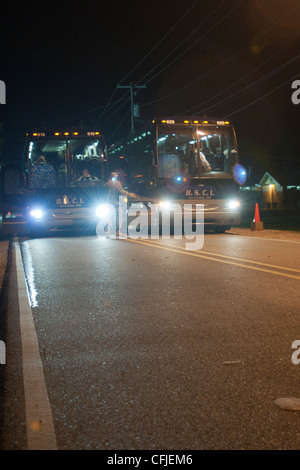 Six busses carrying nearly 200 members of the 45th Infantry Brigade, Oklahoma Army National Guard prepare to leave Camp Shelby, Miss., for the 14-hour ride to Oklahoma City. The 45th has been mobilized in support of Operation Enduring Freedom for a year. More than 2,200 Oklahoma Guardsmen spent about eight months in Afghanistan and another 800 spent the same time in Kuwait. Stock Photo