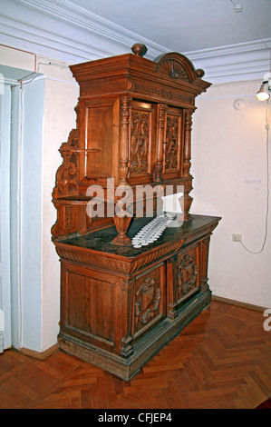 old dresser on parquet floor Stock Photo