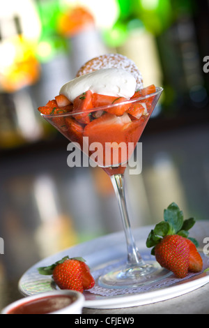 Strawberry shortcake with creme fraiche and sliced fresh strawberries Stock Photo