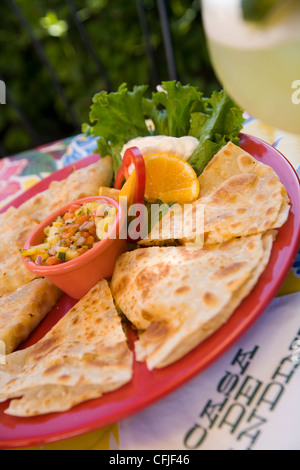 Mexican cheese quesadilla with fresh mango salsa Stock Photo