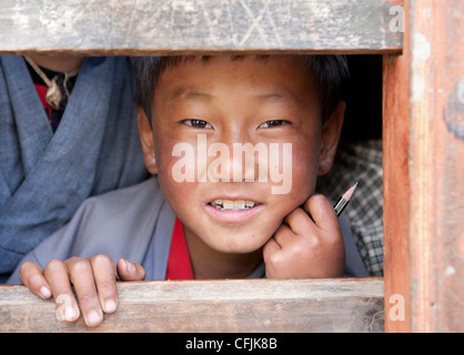 Young boy at his school in Ura Village, Ura Valley, Bumthang, Bhutan, Asia Stock Photo