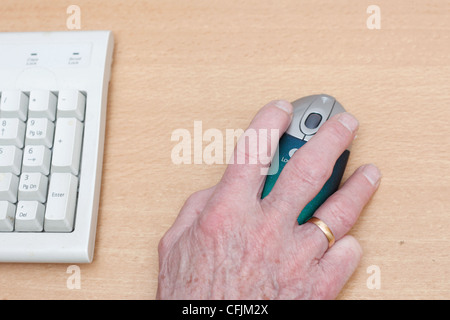 Senior using a computer Stock Photo