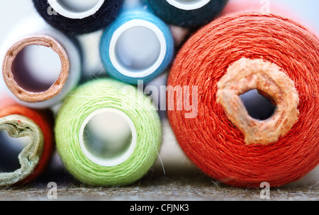 Front view on sewing spools. Macro colorful photo Stock Photo
