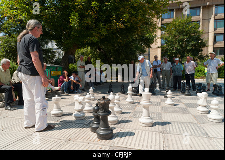 Locals playing giant chess, Sarajevo, Bosnia and Herzegovina, Europe Stock Photo