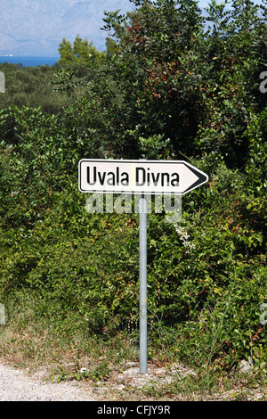 Sign directing to Divna bay, Peljesac peninsula, Croatia Stock Photo