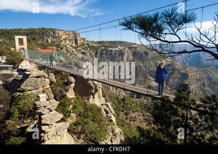 Suspension bridge and viewpoint overlooking Copper Canyon at Divisadero, Chihuahua, Mexico. Stock Photo