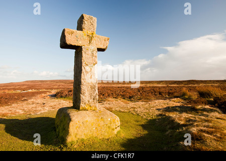 Cowpers Cross, an ancient stone cross stands close to the old Roman road that crosses Ilkley moor, West Yorkshire, UK. Stock Photo