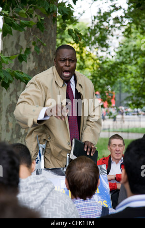 Enthusiastic evangelical preacher, waving his arms around and preaching in Speakers' Corner, Hyde Park, London Stock Photo