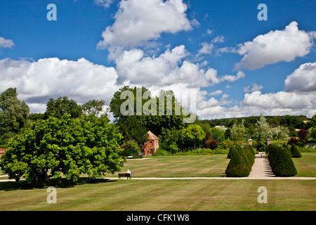 View across the lawn of the English country garden of Littlecote Manor in Berkshire, England, UK Stock Photo