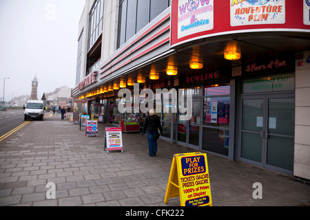 Skegness Town, Lincolnshire, England one of the many amusement halls with signs outside advertising games and bingo Stock Photo