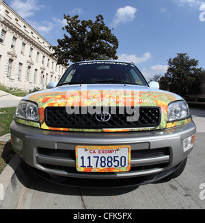 PASADENA, CA - FEBRUARY 29, 2012 - A 'Clean Green Electric Vehicle' parked outside Pasadena City Hall on February 29th, 2012. Stock Photo