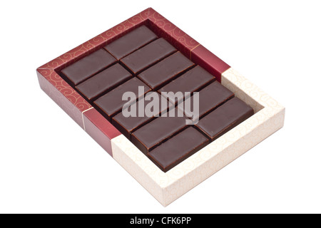 Chocolate pralines in box isolated on white background Stock Photo