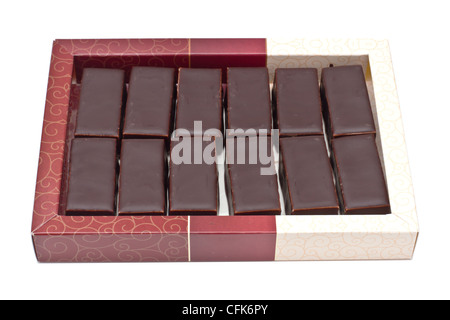 Chocolate pralines in box isolated on white background Stock Photo