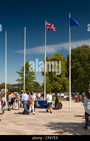 Warwickshire, Stratford on Avon, Waterside, flags flying in front of Royal Shakespeare Company Theatre Stock Photo
