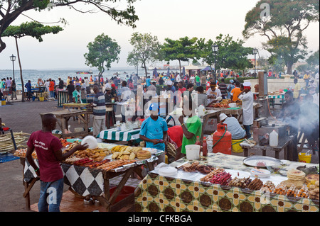 Food vendors selling their unique cuisine at Forodhani Gardens in Stone Town Zanzibar Tanzania Stock Photo