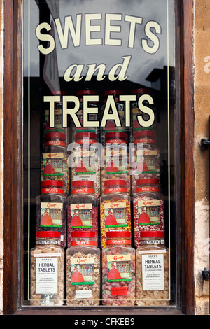 Warwickshire, Stratford on Avon, Sheep Street, old fashioned jars of sweets in shop window Stock Photo