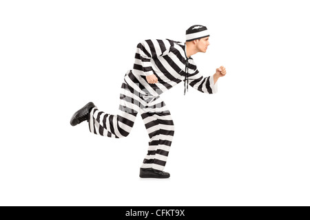 Full length portrait of a prisoner escaping isolated on white background Stock Photo