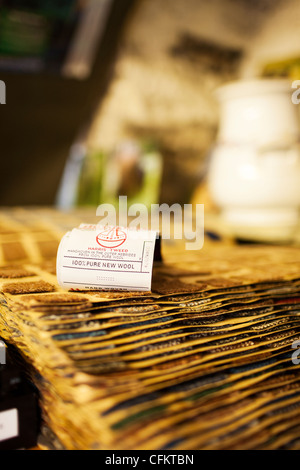 A book of swathes made from Harris tweed wool and a label in a shop in Stornoway  on the isle of Harris in the outer Hebrides Stock Photo