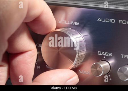 Volume Control knob on amplifier turned up full Stock Photo