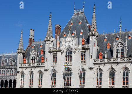 Neo Gothic style government buildings on the main square in Bruges, Belgium Stock Photo