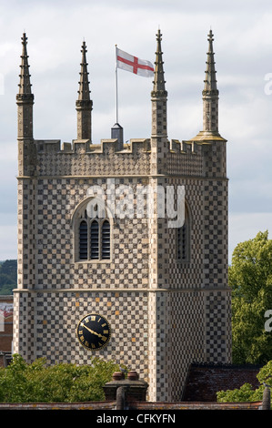 The tower of St Mary's church Reading, England with the flag of St George flying Stock Photo