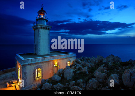 The lighthouse in Akrotainaron ('Cape Tainaron' or 'Cape Matapan') on the southernmost corner of Mani region, Peloponnese. Stock Photo