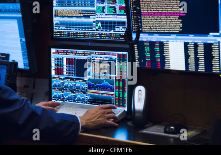 USA, New York State, New York City, Stock trader working on computer Stock Photo