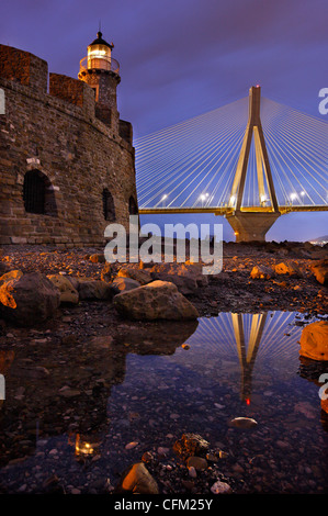 The Rion- Antirion cable bridge and the castle of Antirion with its lighthouse. Etoloakarnania, mainland Greece. Stock Photo