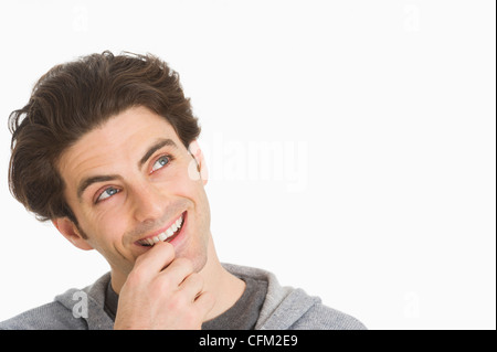 Studio portrait of man smiling Stock Photo