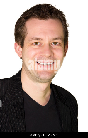 Picture of a smiling man in a dress jacket with a black tshirt Stock Photo