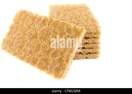 Picture of a bunch of crispbreads with one on the side Stock Photo