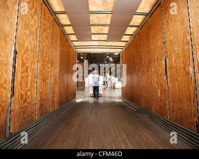 USA, California, Santa Ana, Man working in warehouse Stock Photo