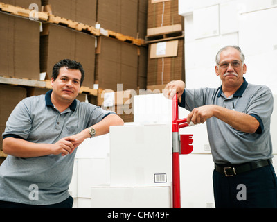 USA, California, Santa Ana, Portrait of warehouse workers Stock Photo