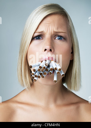 mouthful of tobacco Harmful effects chewing Mouthful cigarettes hi-res stock photography