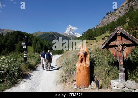Hikers in front of the Matterhorn, Zermatt, Valais, Swiss Alps, Switzerland, Europe Stock Photo