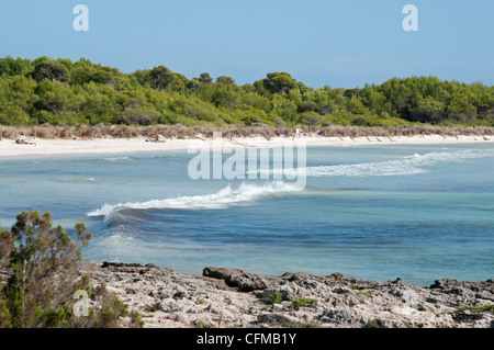 Waves in the shallows on Son Saura beach on the Balearic island of Menorca Spain Stock Photo