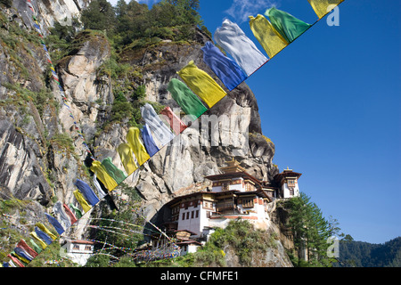 Taktshang Goemba (Tiger's Nest Monastery) and prayer flags, Paro Valley, Bhutan, Asia Stock Photo