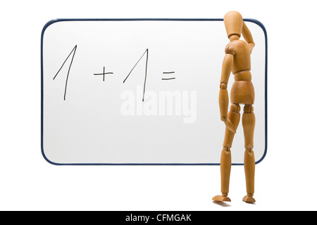 Wooden figure tries hard to find solution for complex problem Stock Photo