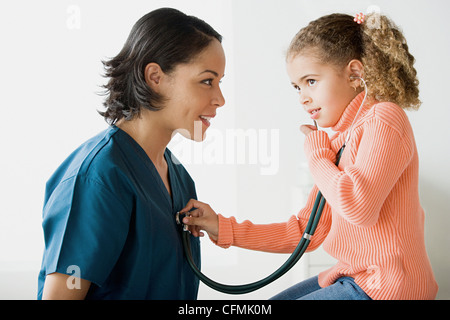 USA, California, Los Angeles, Girl (10-11) examining doctor Stock Photo
