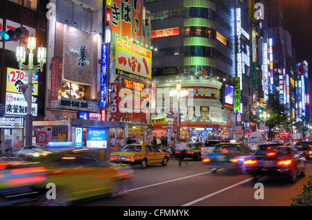 Yasukuni-dori runs along Kabuki-cho, the redlight district of Shinjuku, Tokyo, Japan Stock Photo