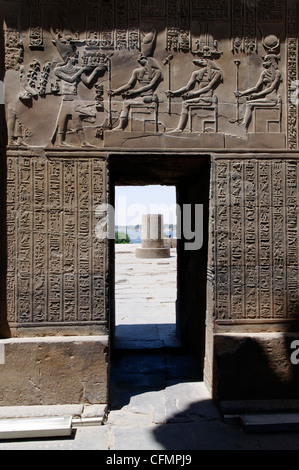 Kom Ombo. Egypt. Africa.View of a highly detailed carving relief surrounding a doorway at the Temple of Kom Ombo. Stock Photo