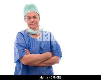 Portrait of female middle aged doctor with arms crossed and confident smile isolated on white background Stock Photo